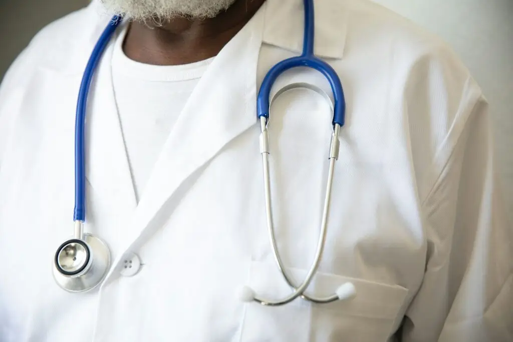 doctor with stethoscope around his neck