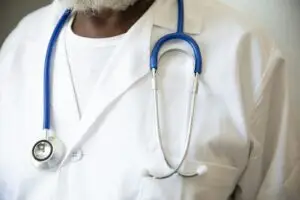 doctor with stethoscope around his neck