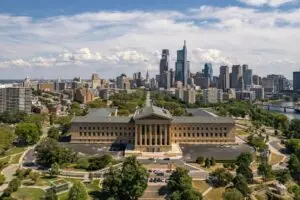 a large building with a Pennsylvania city in the background