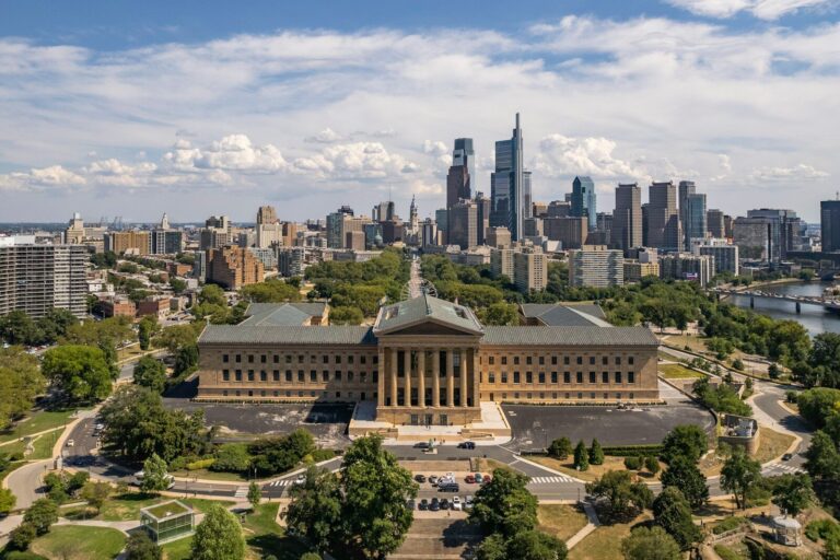 a large building with a Pennsylvania city in the background